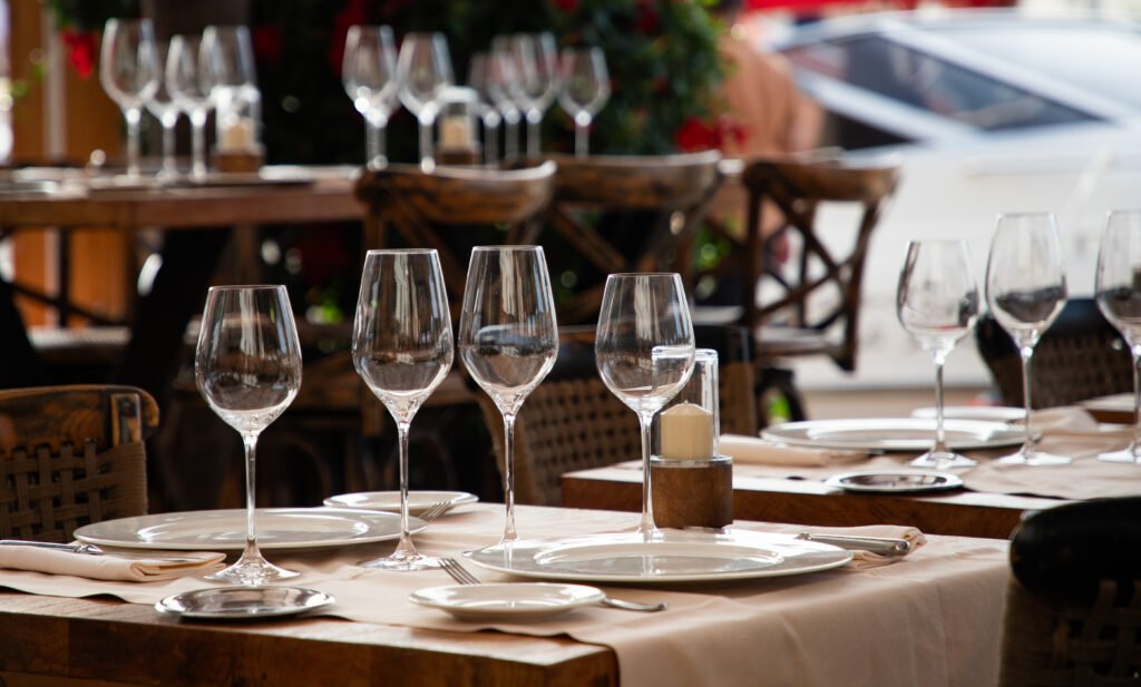 Italian Restaurant Santa Rosa — Capriciano Osteria dining room with wine glasses on a candlelit table