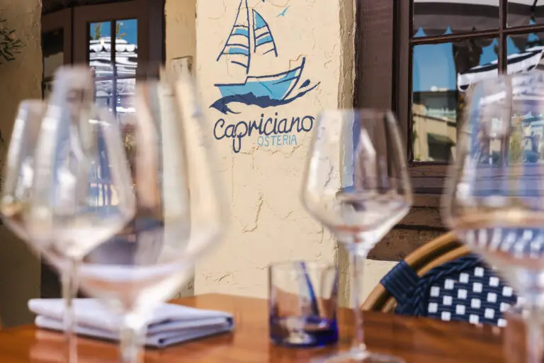 Al Fresco Terrace 4 Wine glasses on a table set for dinner at Capriciano Osteria