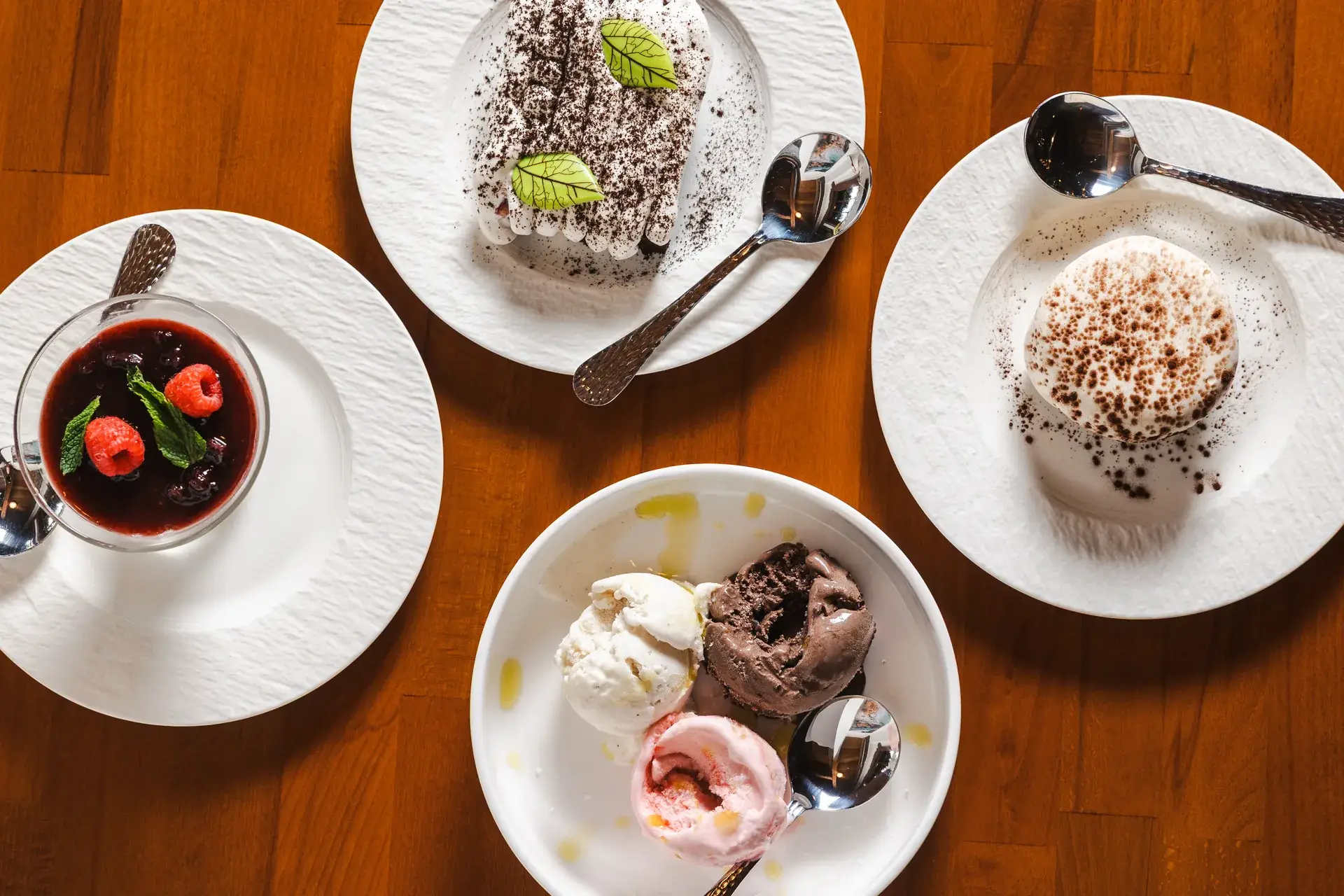 Panna cotta with berries, gelato and cocoa-dusted cake from above, Italian desserts in Santa Rosa at Capriciano Osteria