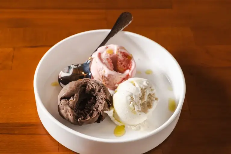 Gelato: chocolate, strawberry and vanilla scoops with an olive oil drizzle at Capriciano Osteria