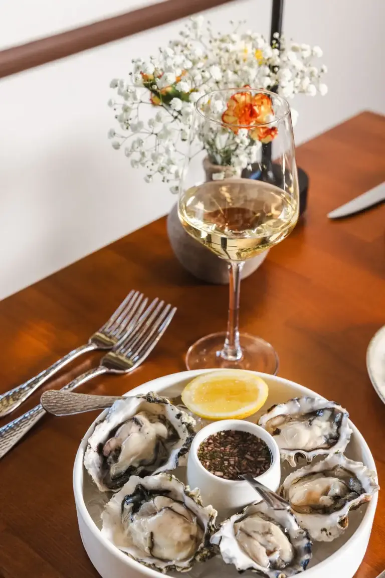 Oysters on the half shell with mignonette and lemon, Italian antipasti in Santa Rosa at Capriciano Osteria