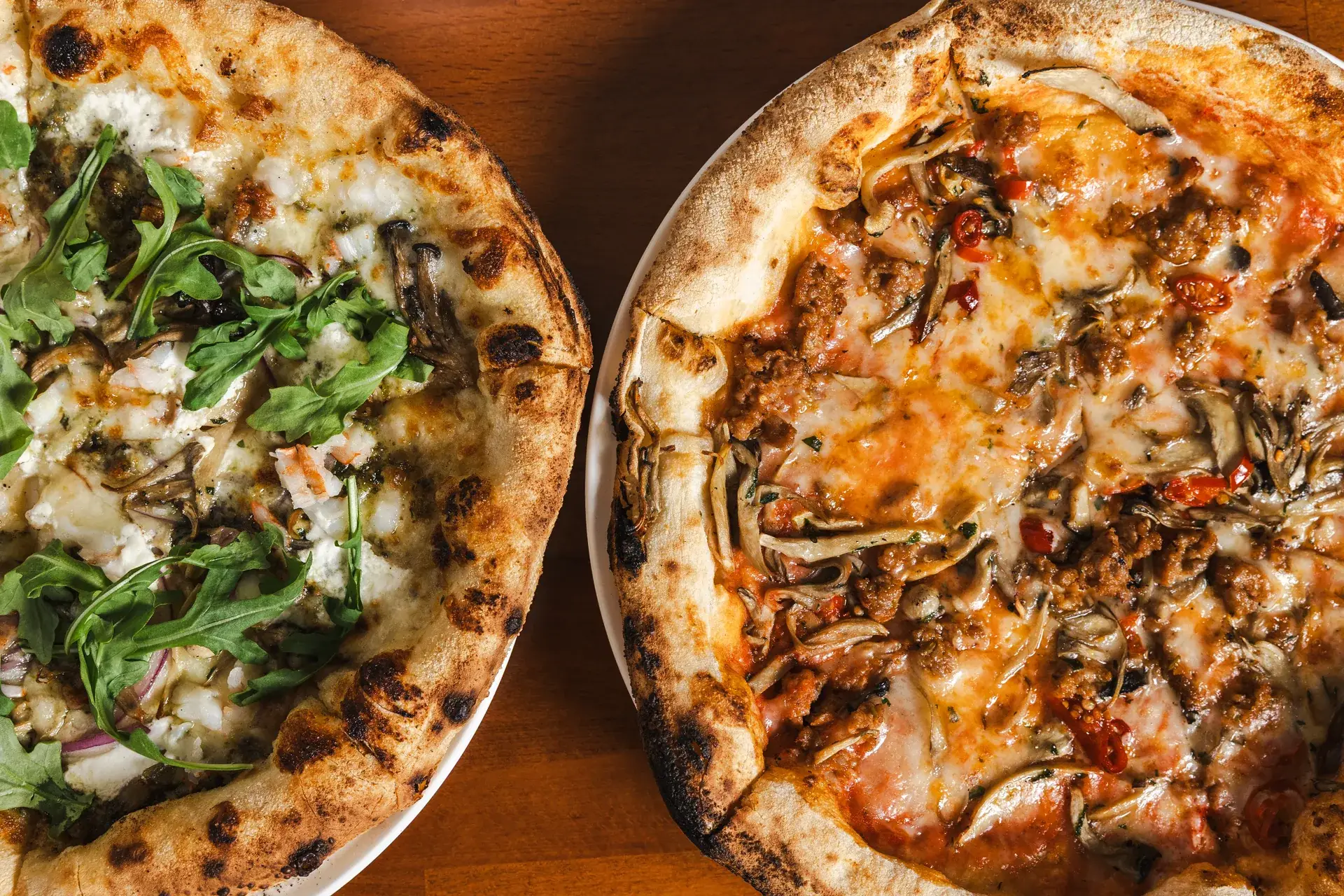 Kid's Menu 1 Two wood-fired pizzas from above at Capriciano Osteria, home of our kids menu in Santa Rosa